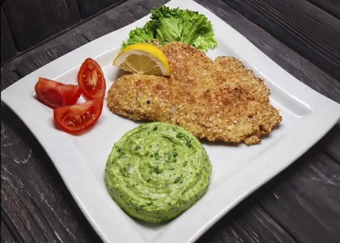 Тілапія з пюре зі шпинату